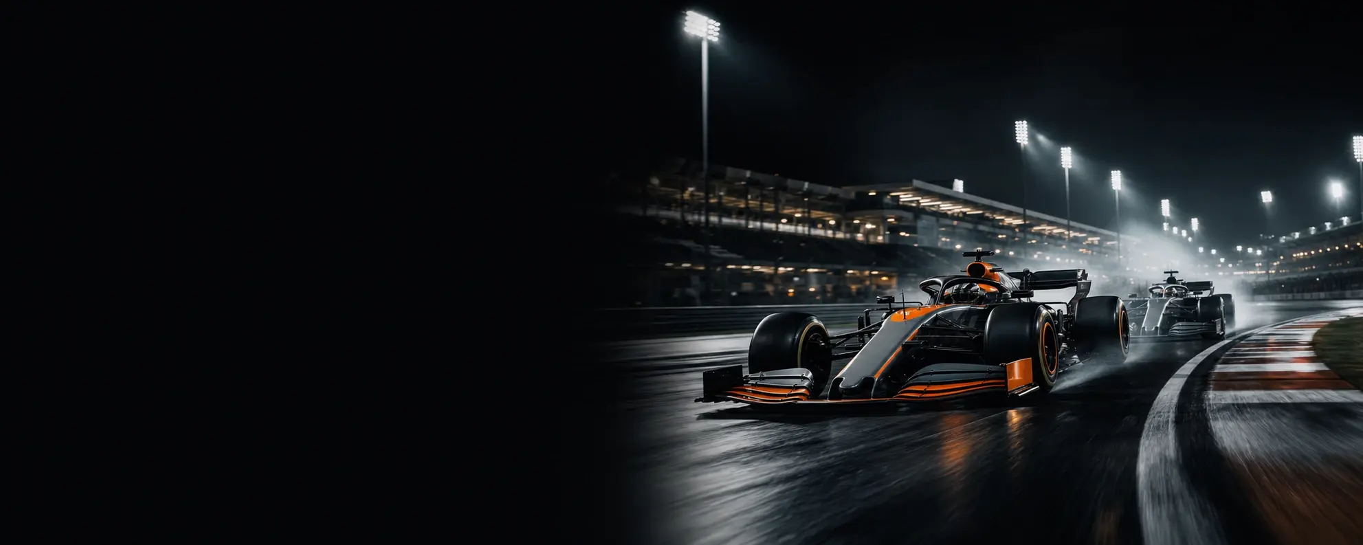 Formula car racing under the lights at night